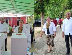 Calon Gubernur Papua Nomor Urut 1 Benhur Tomi Mano dan Istri Coblos di TPS 04 Kelurahan Wahno