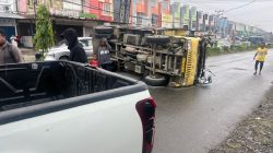 Truk Bak Terbuka Terbalik di Jalan Raya Abepura–Sentani, Begini Nasib 19 Orang Penumpang